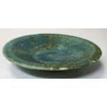 A 13th century Islamic Persian Kashan dish, 15.5cm (6in)