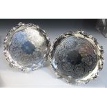 A pair of Victorian silver waiters, by Walter & John Barnard, London 1894, each of circular shape