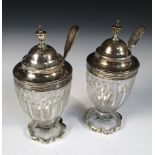 A pair of George III silver mounted glass mustard jars, the reeded mounts by Charles Chesterman