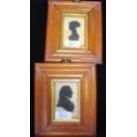 A pair of framed portrait silhouettes of a lady and gentleman, 16 x 3cm