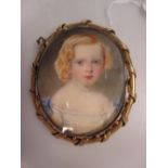 William Egley, British 1826-1916, an oval portrait miniature of a young girl with blonde hair,