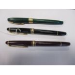 A black and a maroon Mont Blanc ball pen together with a green Schaeffer fountain pen (3)