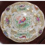 Six dessert dishes decorated with exotic birds and a serving dish together with other ceramics