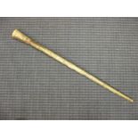 A turned horn swagger stick