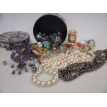 A large quantity of good quality, mostly costume jewellery, but also including a 22ct gold wedding