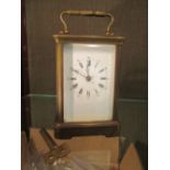A striking Carriage clock 12cm tall