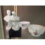 An 18th century Bow porcelain white glazed figure of a nun (restored); Newhall bowl and an 18th