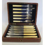 A set of fish knives, cased