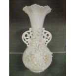 A black marked Belleek baluster vase