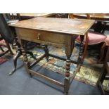 A late 17th century oak side table with single drawer, on bobbin turned and stretchered legs, 72 x