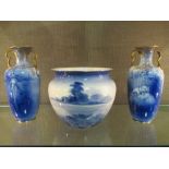 A pair of Doulton blue and white vases together with a planter (3)