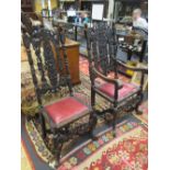 A set of eight Jacobean style dining chairs including two carvers with carved backs and arms, on