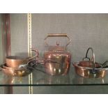 A collection of copper pans and a copper kettle (8)