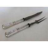 A Danish 925 standard carving knife and fork (2)