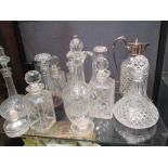 Thirteen various decanters and carafes