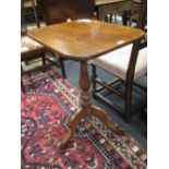 A 19th century mahogany tripod table with tilt-top, 74 x 56 x 46 cm; together with a George III