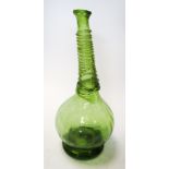 A Beykoz or Persian green glass saddle flask, possibly 18th/19th century, the spiral trailed slender