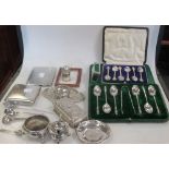 Two cased sets of silver spoons with silver cigarette cases, cruets etc