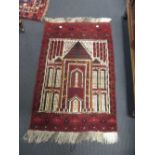 A prayer rug, 110 x 71cm and a larger hand knotted rug, 192 x 147cm (2)