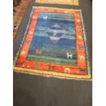 A tribal wool rug, 207 x 155cm together with another (2)