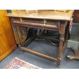 An early 18th century oak side table with single drawer, on turned and stretchered legs, 67 x 77 x