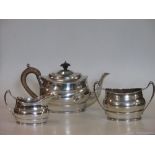 A silver three piece tea set, 20.5 oz
