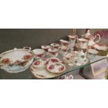 A Royal Albert Old Counrty Roses tea set, together with a miniature tea set, a tete a tete, etc