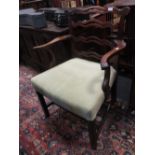 A George III mahogany ladder back armchair, reduced back