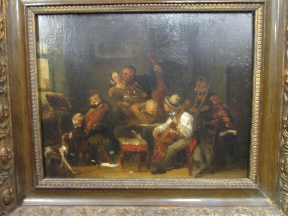 Follower of Jan Steen, The Music lovers, oil on panel, old label in Dutch to verso loosely