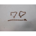 Three bracelets each set with a heart shaped padlock clasp stamped for 9ct gold, (46.8g)