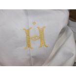 Two boxes of assorted white bed linens to include some with a yellow embroidered H initial