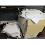 Three boxes of assorted white linen to include single and double sheets, various pillow cases etc.