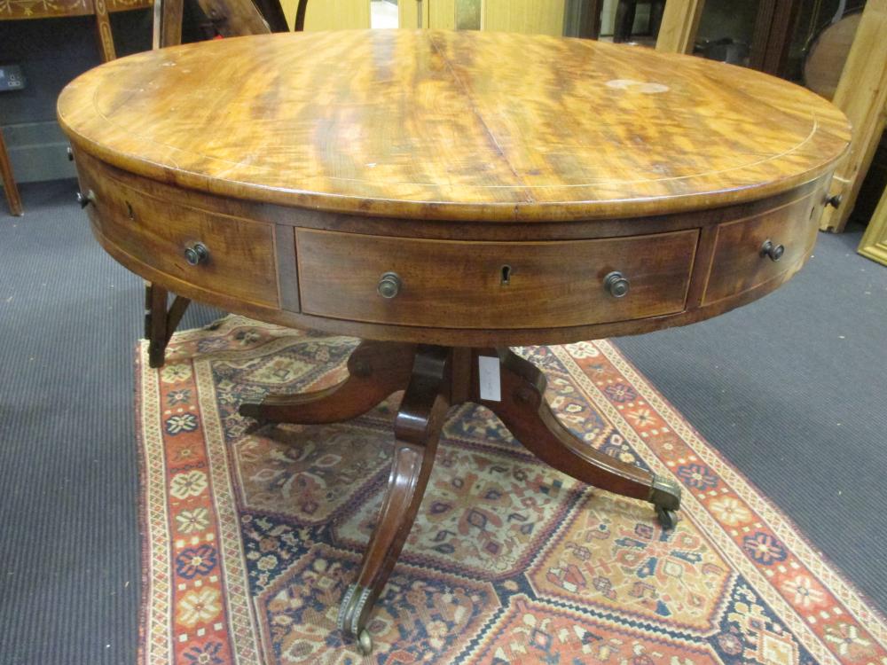 A 19th century satin wood drum top library table, 75 cm high x 106 cm diameter (a/f)