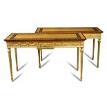 A pair of modern neo-classical satinwood console tables, each with a painted border of trailing leaf