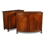 A near pair of Regency mahogany bow front side cabinets, with ebony line inlaid decoration, on