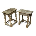 A near pair of 17th century oak coffins stools, on joint supports, with minor size differences (2)