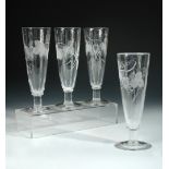 A set of four 18th century ale glasses, each with tall slender conical bowl engraved with hops and