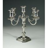 An 18th century style silver five light candelabrum, by The Atkin Brothers, Sheffield 1957, raised
