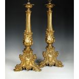 A pair of mid-19th century ormolu table lamps, the baluster columns cast with acanthus scrolls