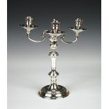 A modern silver three light candelabrum, by J A Campbell, London 1997, the stepped circular base