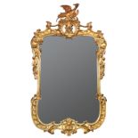 A carved wood and gesso moulded gilt framed mirror, with a Ho-Ho bird cresting and frame carved with