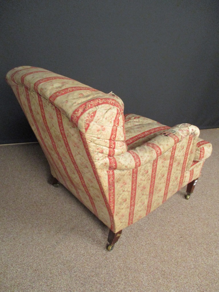 A Howard & Sons upholstered armchair, stamped, Berners Street , no 18098 602, on tapering square - Image 5 of 5