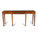 A 19th century Adam style pine serving table, with a shaped front, fitted three concealed drawers,