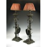 A pair of late 19th century bronze oil lamp torcheres, Perry & Co., New Bond Street, each