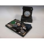 A quantity of silver and silver plated items and a black slate mantel clock