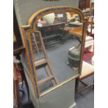 A rounded topped rectangular mirror in 'azurite' inlaid frame