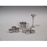 Five napkin rings, three piece cruet, Christening mug and bud vase (10)