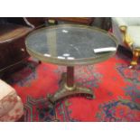 A 19th century Empire style mahognay and gilt metal mounted marble topped occasional table