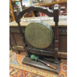 A Victorian gong stand with clapper, 51cm wide (2)