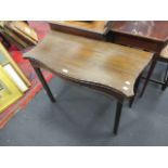 A mahogany envelope tea table with an egg and dart freize single drawer and inner chamfered legs,